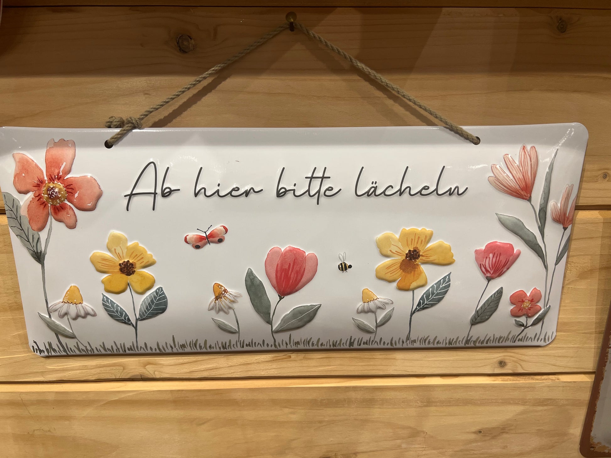 Blechschild Bitte lächeln